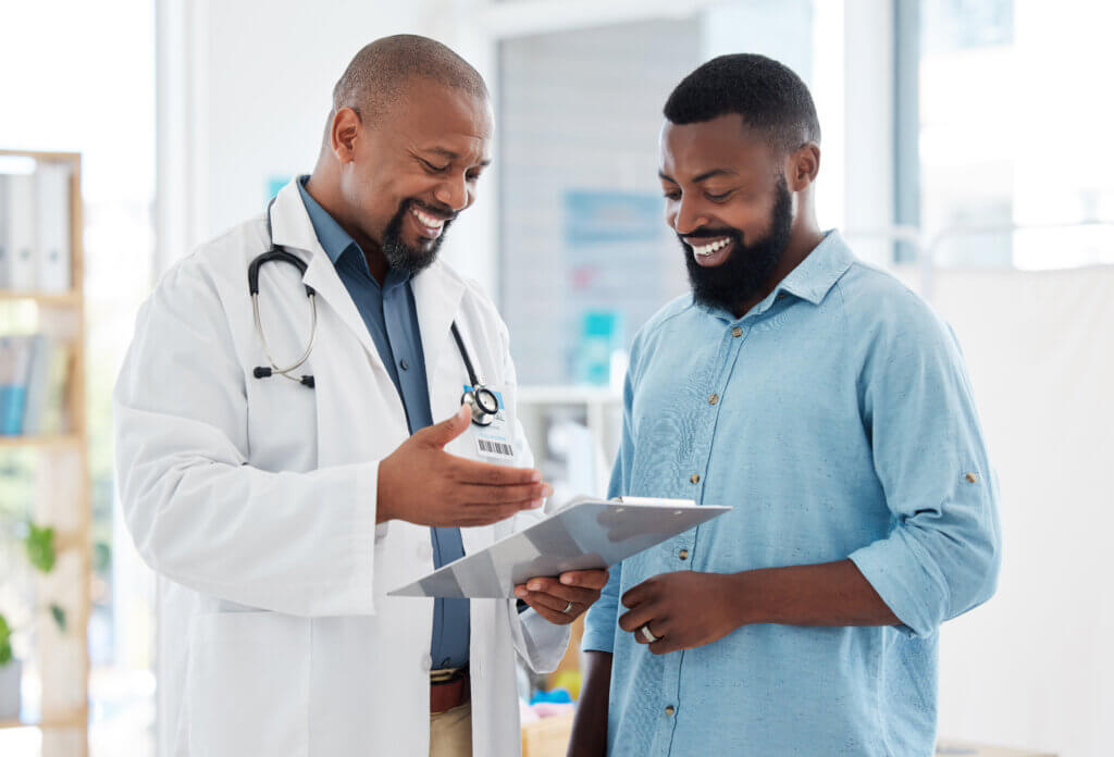 doctor speaking with a patient about a brown recluse spider bite