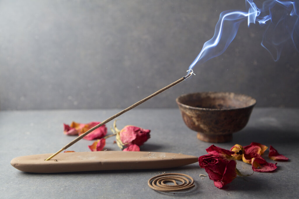 Incense stick. Aromatherapy whit petals